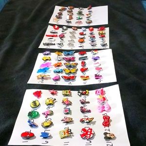 Croc charms PICK ANY 10 FOR $25 Football, Basketball, Super hero's, sponge Bob.